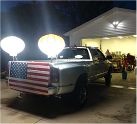 Portable Lighting Solutions on the back of my truck at night